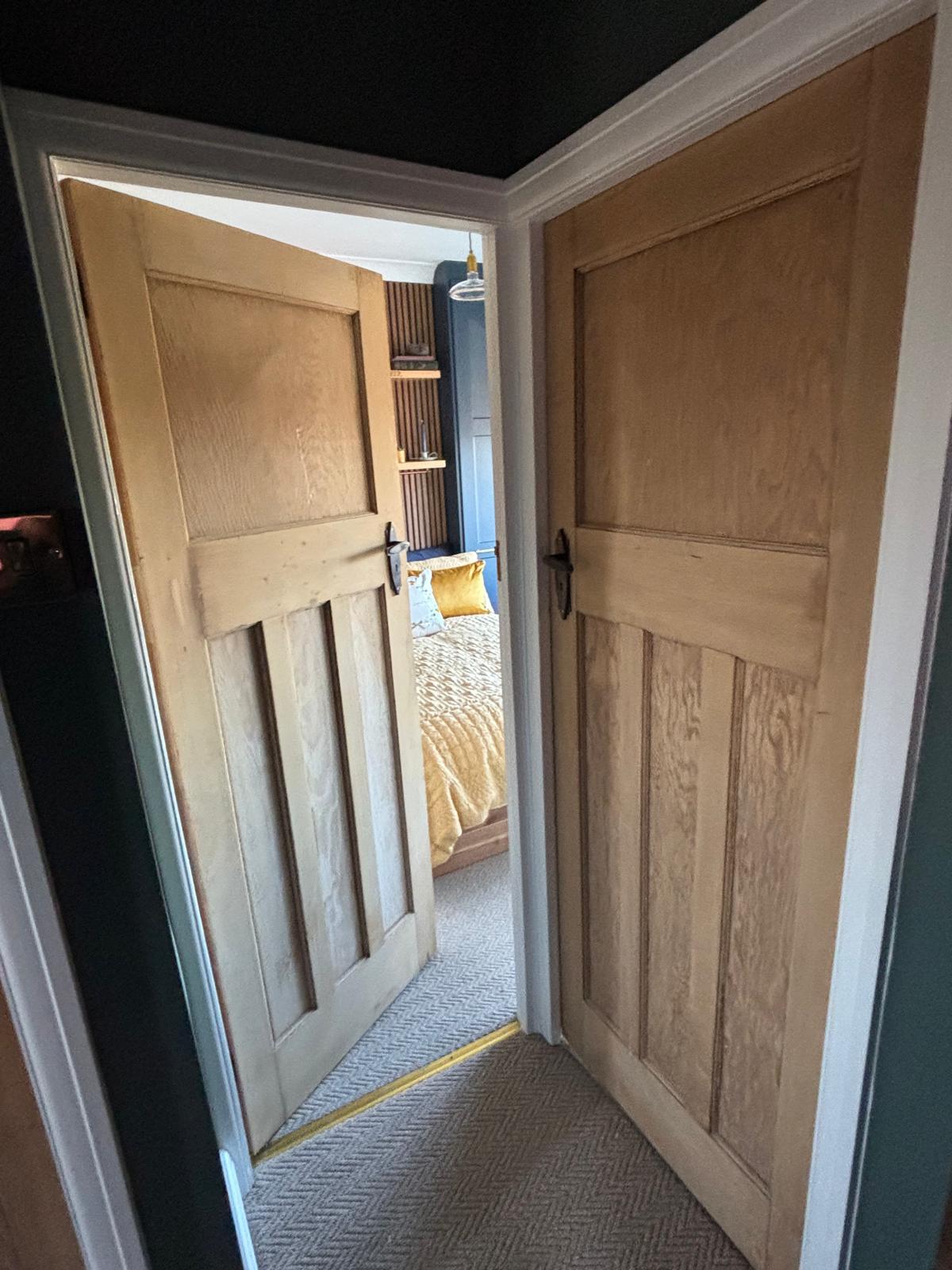 Before and after of a panelled front door paint-stripping project completed at the Double Dipper workshop