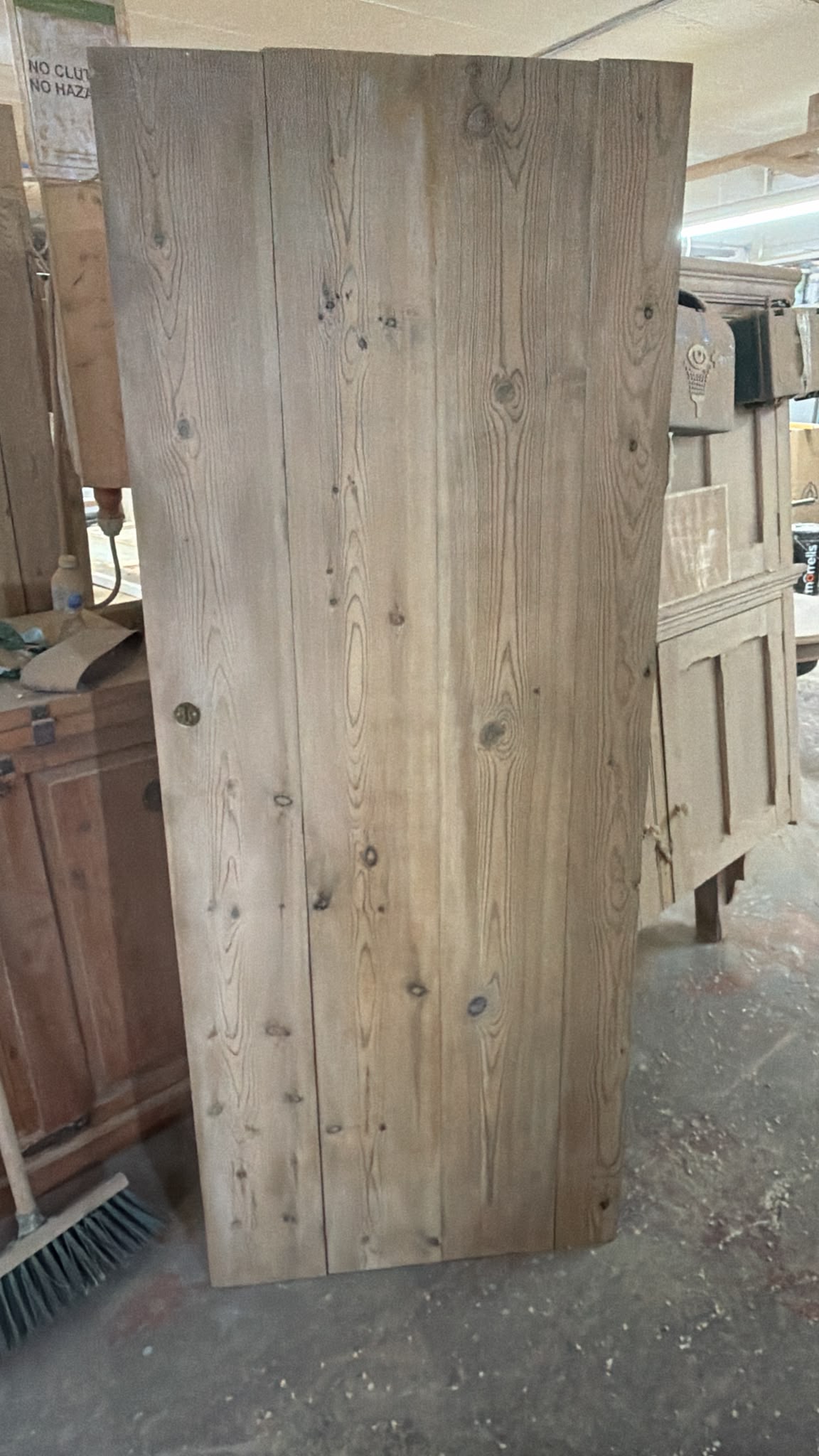 Reclaimed barn style door stripped and restored to bare wood ready for finishing