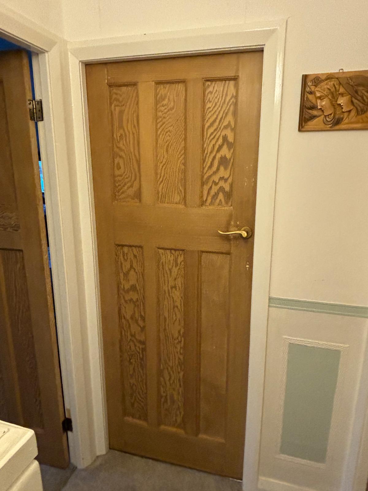 A panelled front door stripped back and repainted, restored by Double Dipper Paint Strippers in Yorkshire
