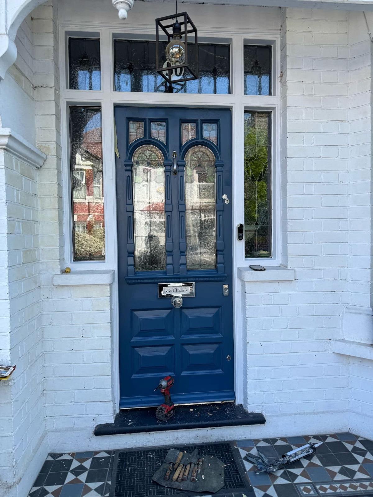 Before and after of a Victorian front door stripped of old paint and refinished, set in a Yorkshire terrace